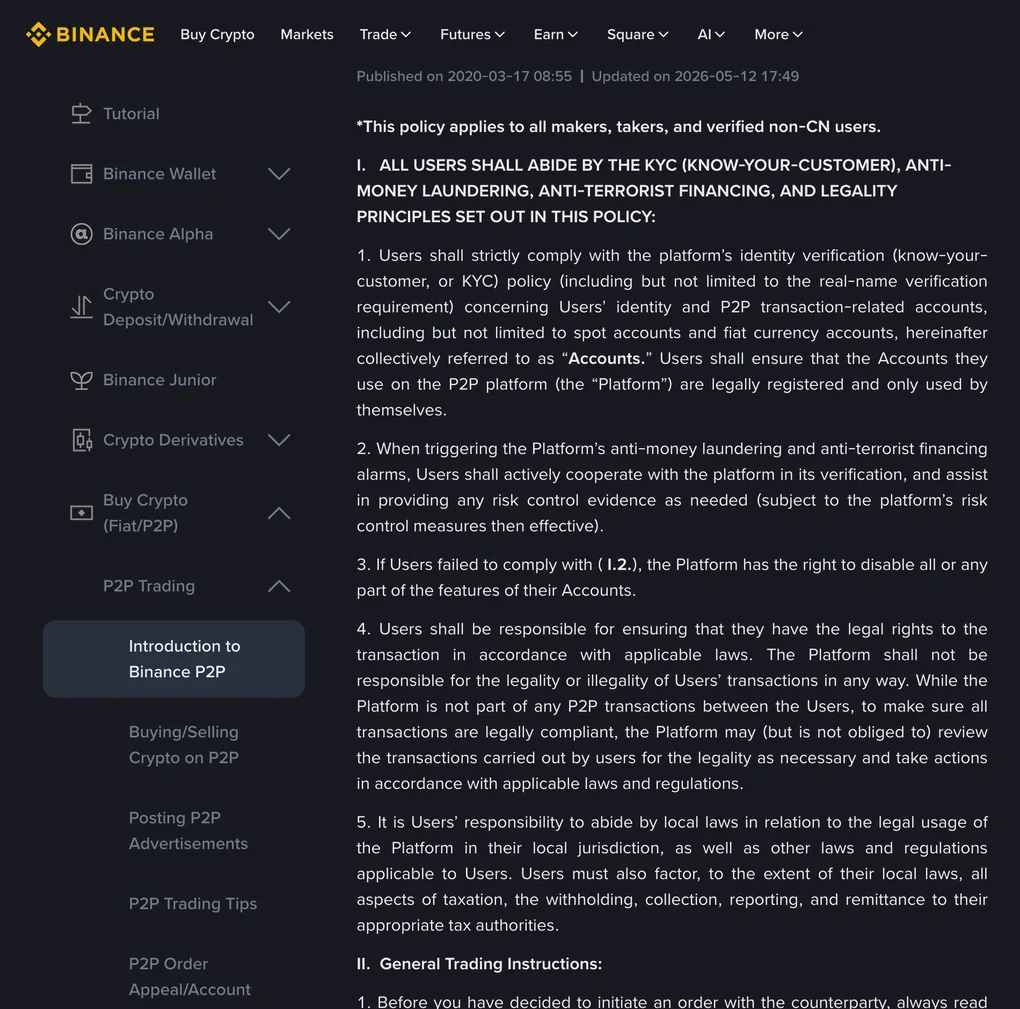 币安帮助中心里的 P2P 用户交易政策页：左侧是 P2P 相关文档的导航目录，右侧正文第 I 条写明所有用户须遵守实名认证、反洗钱与反恐融资条款，触发风控警报时须配合平台核查，不配合的平台有权停用账户全部或部分功能